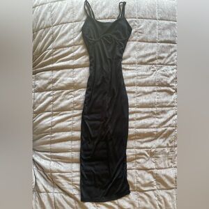 Black bodycon tight form fitting midi Maxi dress with slit and zipper back